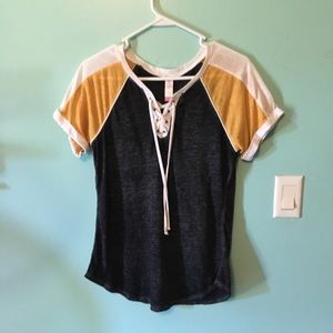 yellow, grey/black, and white t-shirt